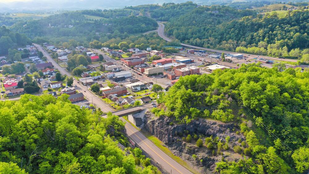 Aerial View of St. Paul Virginia – Appalachian Mountain Town, Summer Greenery, and Historic Downtown