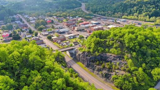 Aerial View of St. Paul Virginia – Appalachian Mountain Town, Summer Greenery, and Historic Downtown