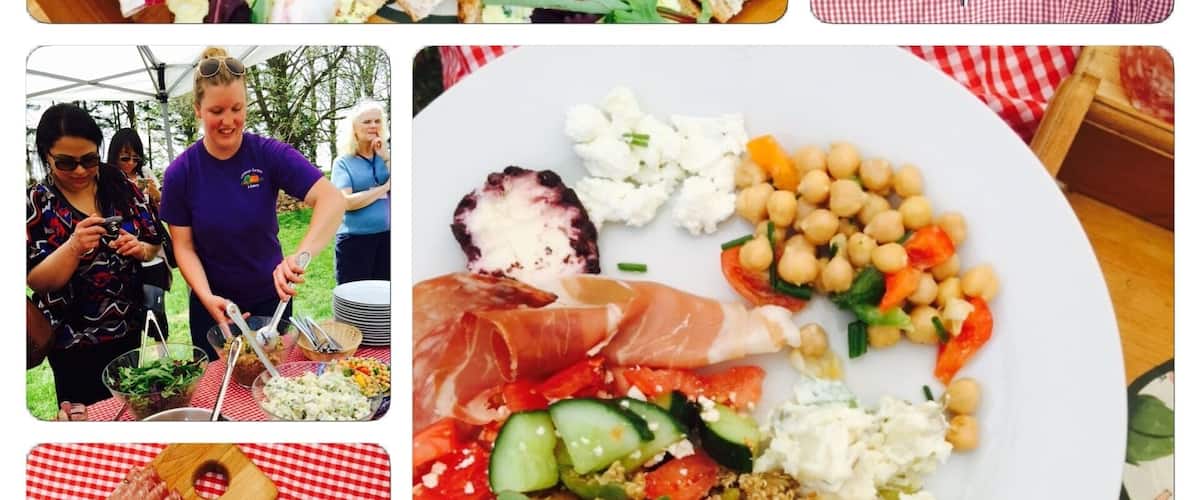 A variety of food items including sandwiches, salads, and charcuterie.