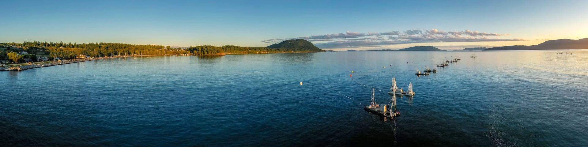 Reefnet Salmon Fishing Boats Off Lummi Island, Washington. Wild Pacific salmon reefnet fishing is an historical Pacific Northwest fishing method- the oldest known salmon net fishery in the world.
