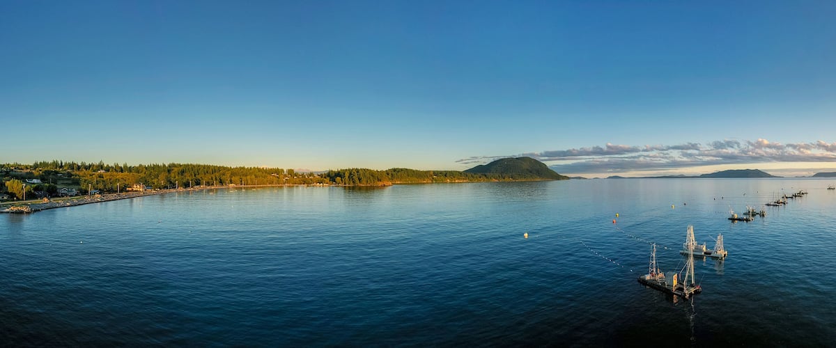 Reefnet Salmon Fishing Boats Off Lummi Island, Washington. Wild Pacific salmon reefnet fishing is an historical Pacific Northwest fishing method- the oldest known salmon net fishery in the world.