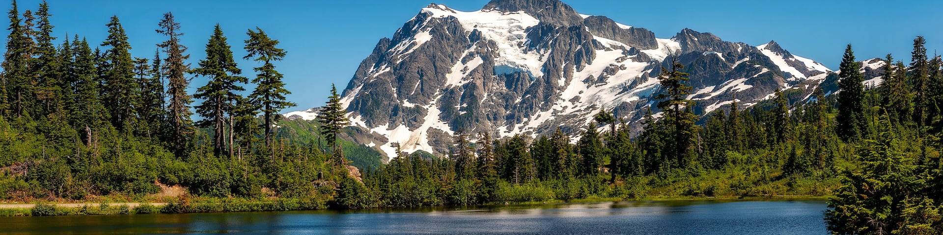 Picture Lake with Mount Shuksan in the Background. This Lake is the centerpiece of a strikingly beautiful landscape in the Heather Meadows area of the Mt. Baker recreation area.