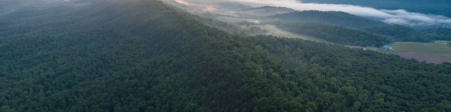 Colorful Sunrise in Forest Clad Appalachain Mountains