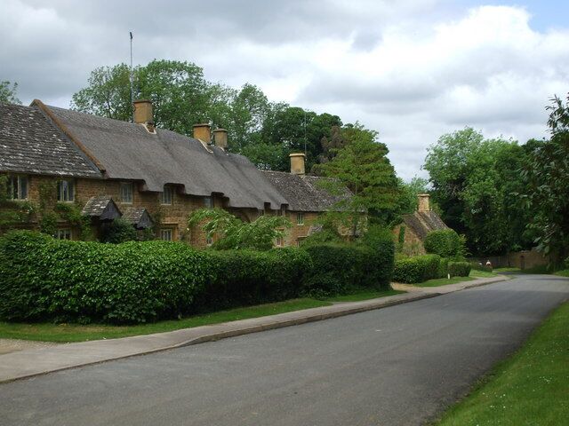New Road, Great Tew, by church path entrance The entrance to the church, some distance away, is immediately behind photo position. There is a golden Georgian house to the left of photo, but extensive building work meant a photo would be misleading.