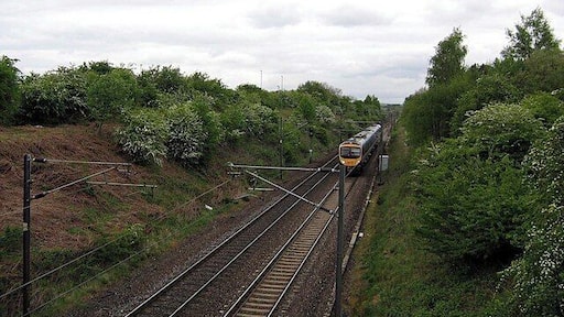 London Train approaching Littleburn Farm Railway Bridge