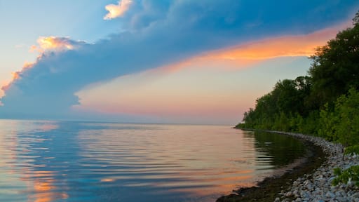 Sunset on Rocky Beach on Green Bay, Lake Michigan at Olde Rock Quarry County Park, Sturgeon Bay, Door County, Wisconsin, USA