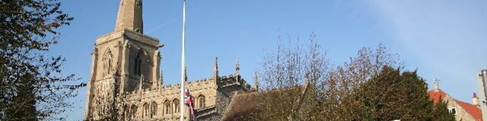 St Martin's parish church, Ancaster, Lincolnshire: view from the southeast, showing the 14th-century west tower and spire