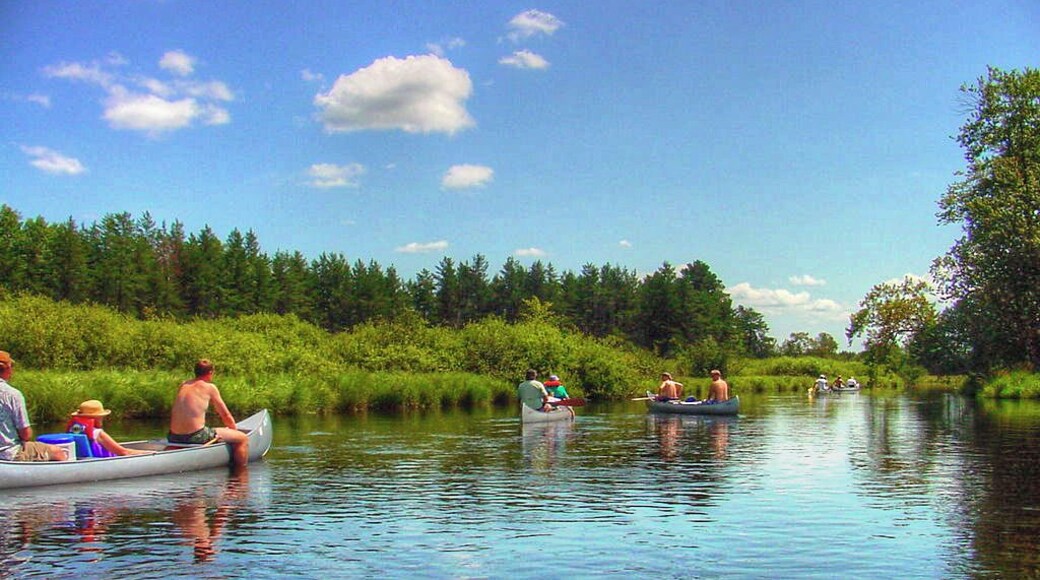 Gentle canoe trip down the Tomahawk River near Rhineland and Mincoqua Wisconsin. Be sure to check river flow before any float trip, and make sure people are trained to operate and steer the boat and know how to paddle. Rivers can be very dangerous when things go wrong.