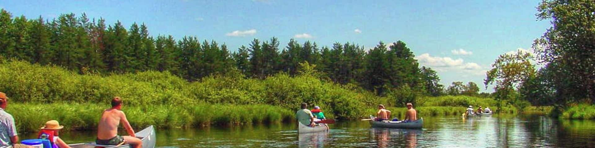 Gentle canoe trip down the Tomahawk River near Rhineland and Mincoqua Wisconsin. Be sure to check river flow before any float trip, and make sure people are trained to operate and steer the boat and know how to paddle. Rivers can be very dangerous when things go wrong.