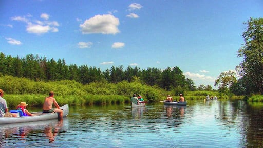 Gentle canoe trip down the Tomahawk River near Rhineland and Mincoqua Wisconsin. Be sure to check river flow before any float trip, and make sure people are trained to operate and steer the boat and know how to paddle. Rivers can be very dangerous when things go wrong.