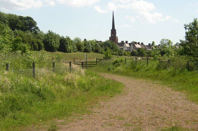 Footpath near Woodlands, South Yorkshire, with the tower and spire of All Saints' parish church