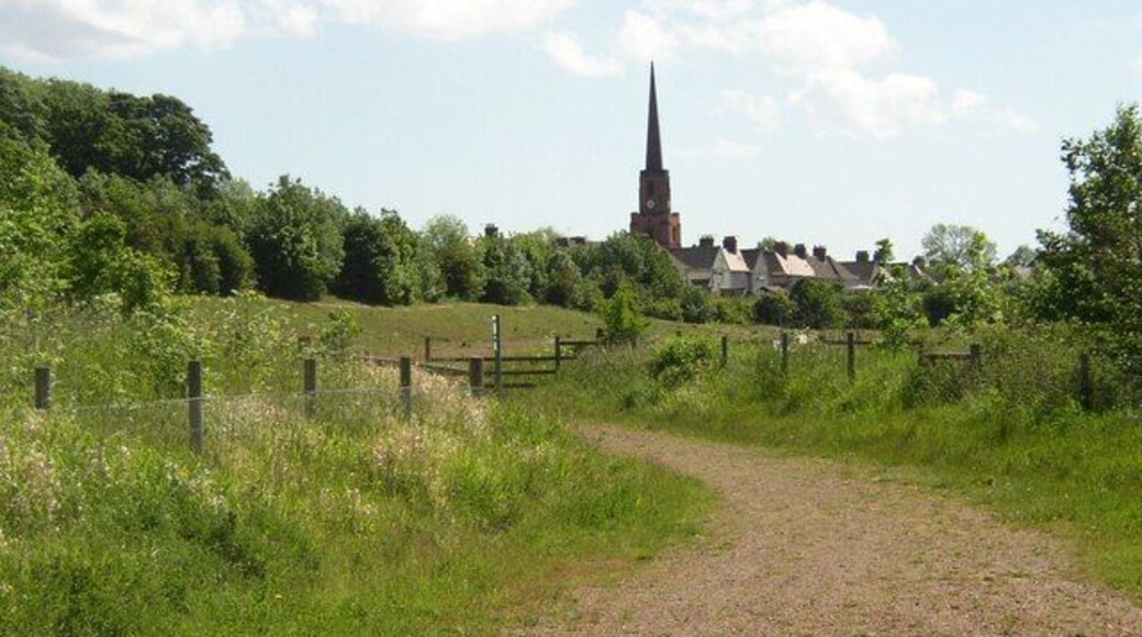 Footpath near Woodlands, South Yorkshire, with the tower and spire of All Saints' parish church