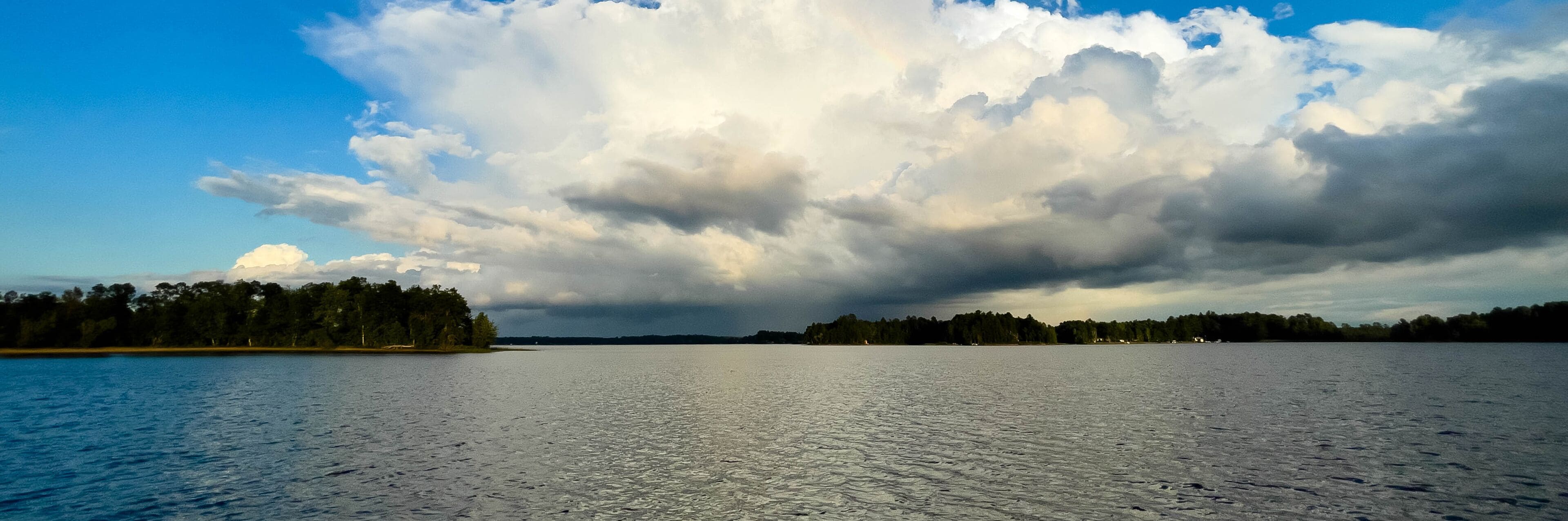 Rain clouds in the distance on Lake Nokomis in Tomahawk, Wisconsin