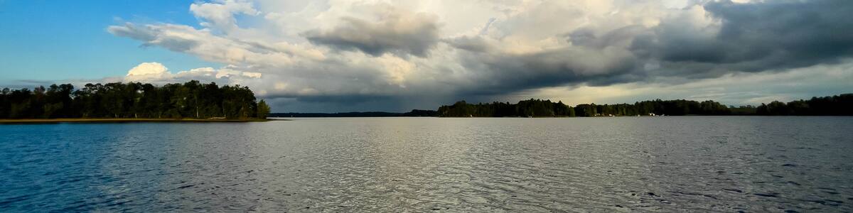 Rain clouds in the distance on Lake Nokomis in Tomahawk, Wisconsin