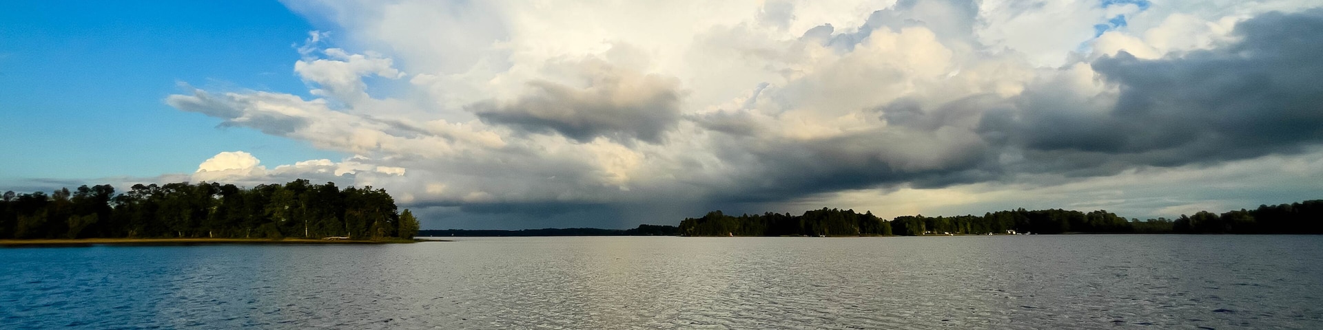 Rain clouds in the distance on Lake Nokomis in Tomahawk, Wisconsin