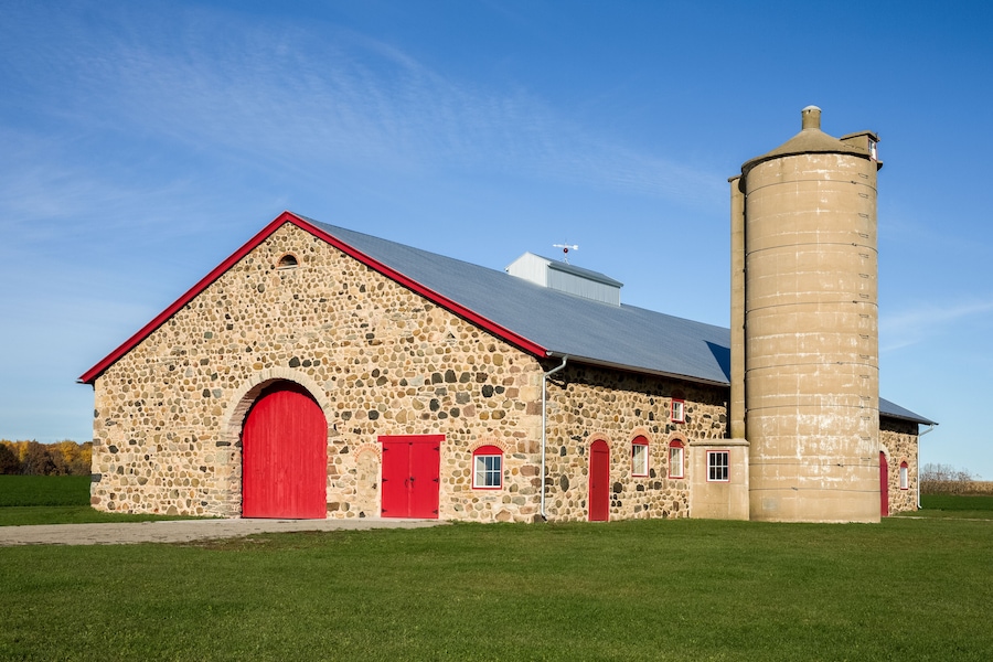Retro Stone Barn with Bright Red Doors