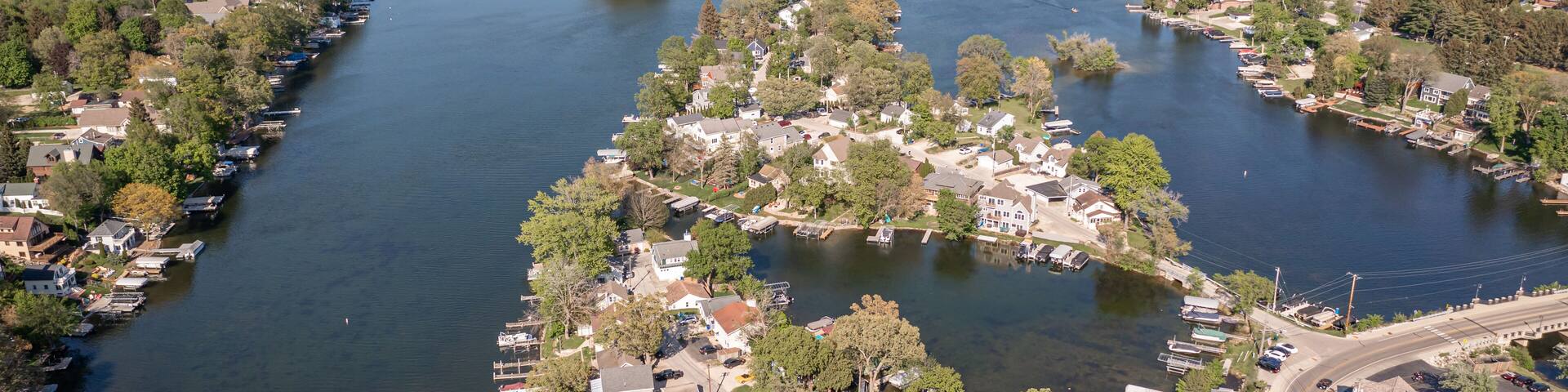 Oconomowoc, WI USA - May 17, 2021: Aerial view of Okauchee Lake