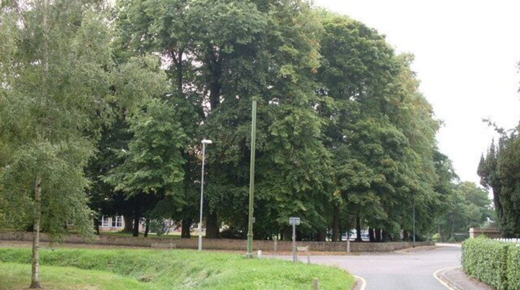 Impington, Cambridgeshire The entrance to Clay Close Lane with a glimpse of Impington Village College among the trees on the left.