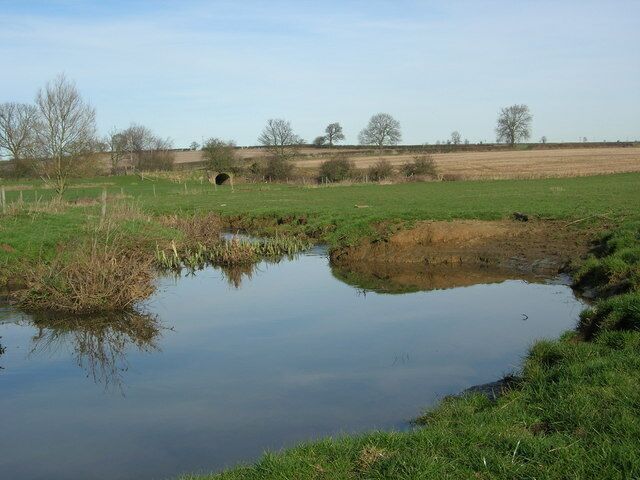 Black Ouse Black Ouse river with bridge carrying disused railway line in middle distance.