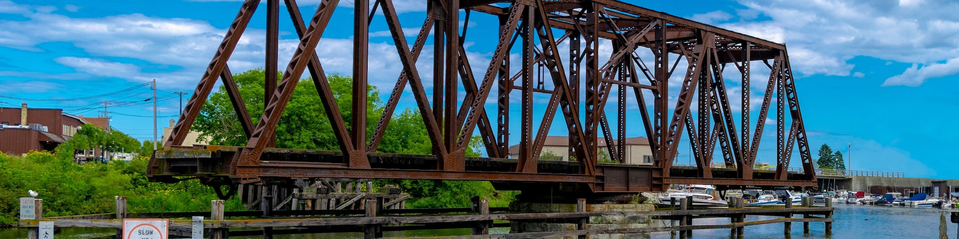 Rotating / swing span rail bridge on the West Twin River in Two Rivers, Wissconsin. No longer in use.; Shutterstock ID 1384485863; Purchase Order: -