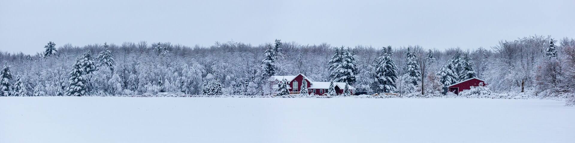 Red house after a December snow storm in Wisconsin