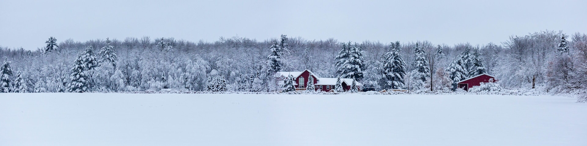Red house after a December snow storm in Wisconsin