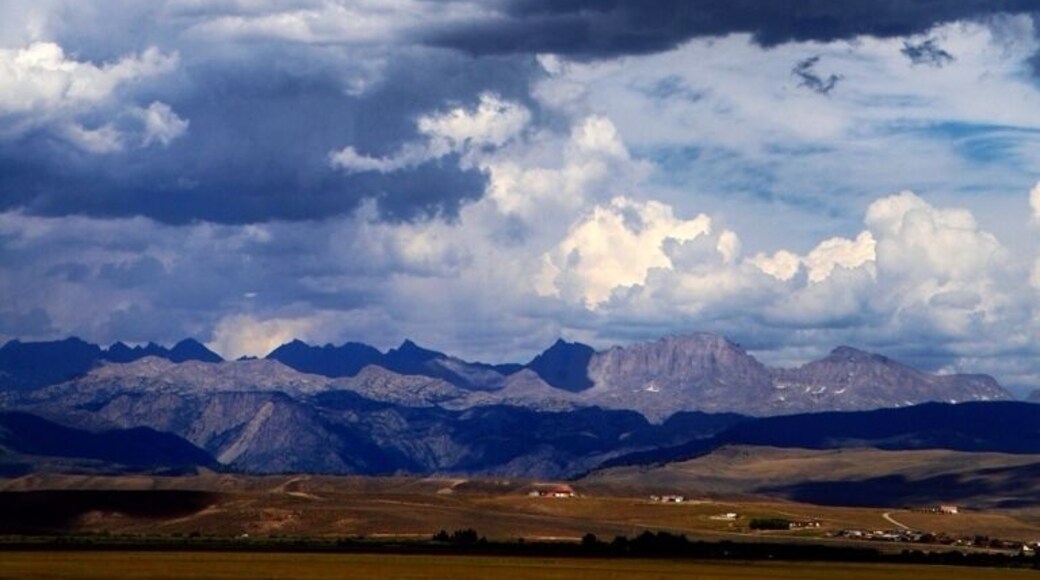 Highway 191 parallels a particularly rocky and tall part of the Rockies. Way off in the distance you see these towering peaks and snow fields hidden in the recesses. It is a beautiful drive, but seeing these mountains off in the distance just teases you.