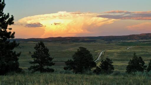 This was taken off of Highway 319, south of Glendo looking east over the valley. The Platte River runs on the east side of the valley. This cloud looks like a nuclear explosion in Nebraska:)