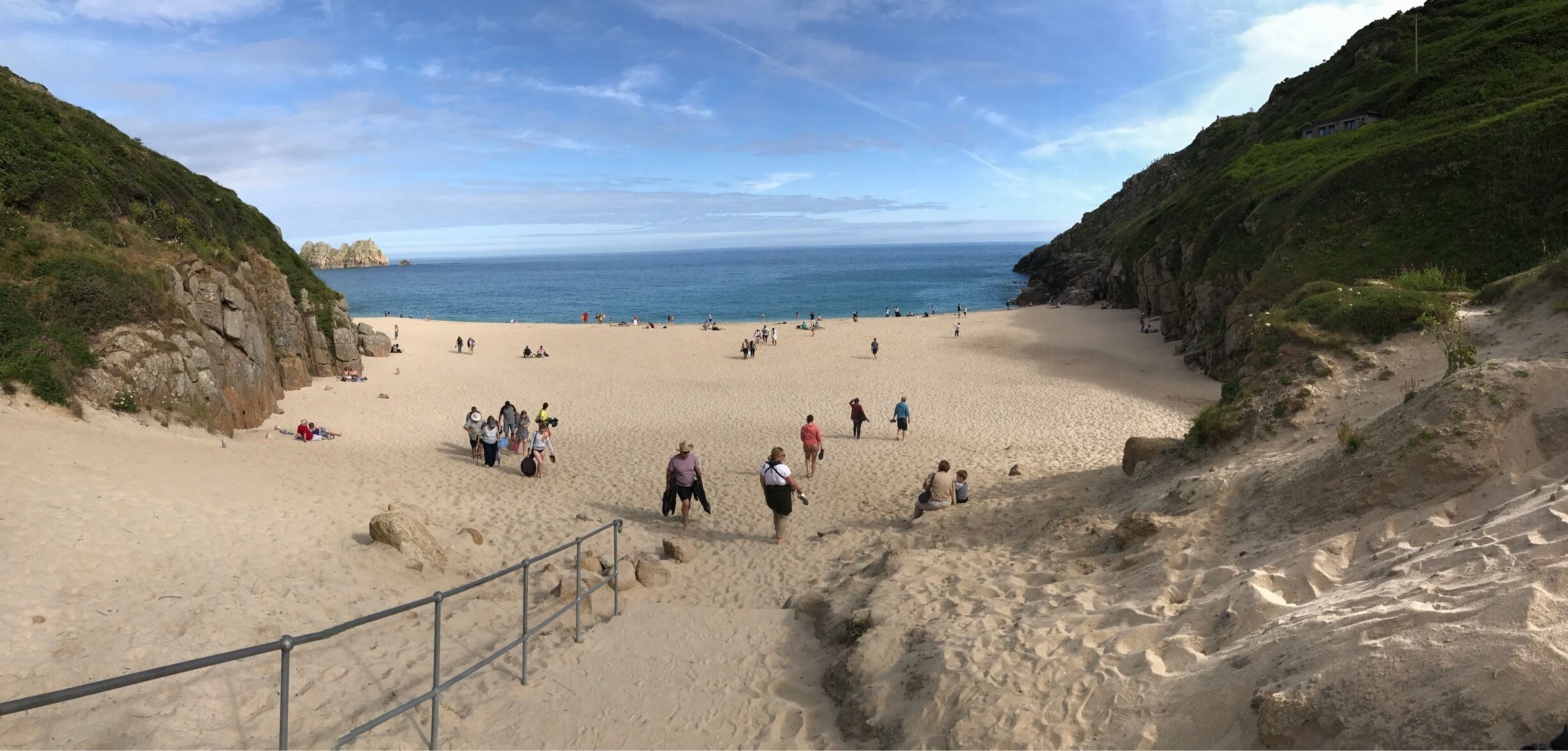 Beautiful beach with steep steps leading up to the Minack Theatre. 