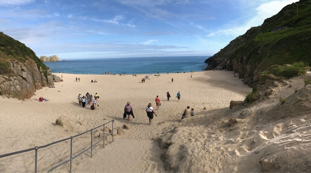 Beautiful beach with steep steps leading up to the Minack Theatre.