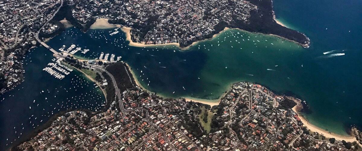 Flying into Sydney - The Spit & Chinamans & Balmoral Bch in the foreground. You can see the ferries going in&out of Manly - top. #sydney #aerialview #harbour #ferry #boats #wewhotravel #lifeatexpedia
