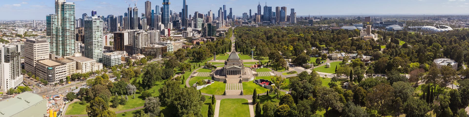 Aerial panoramic image of the city of Melbourne and the Shrine of Rememberance through to the AAMI Stadium from the Botanic Gardens