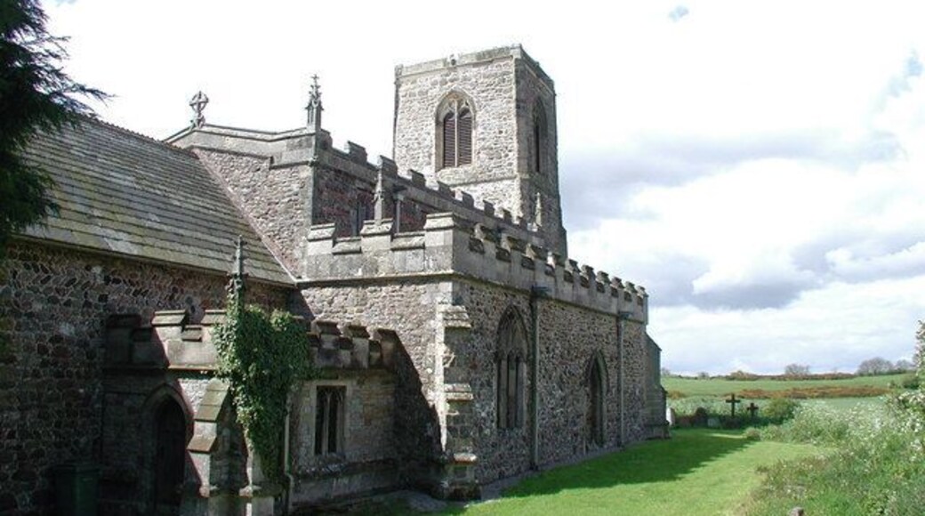 All Saints Church, Skipsea, East Riding of Yorkshire, England. Skipsea Castle was recorded as having a church in around 1100 and the dedication to All Saints or All Hallows was recorded from about 1500. In 1311 the vicar in this seemingly quiet East Yorkshire village was censured for an unspecified offence with a woman, and in 1578 and 1650 women from Skipsea and neighbouring Ulrome were accused of witchcraft. In 1665 it appears that minister Ralph Cornwall was replaced at All Saints because of drunkenness, brawling and other offences. The church has been much altered having fallen into disrepair on many occasions. It was probably rebuilt in the 14th century and was rebuilt from an almost ruinous state in 1866 to designs by James Fowler of Louth.