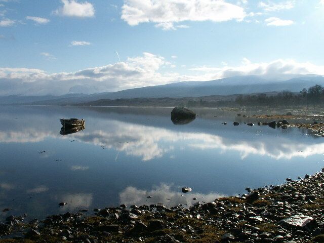 A boat, a plane and the Ben. Looking south east along the shoreline from the western head of Loch Eil.
