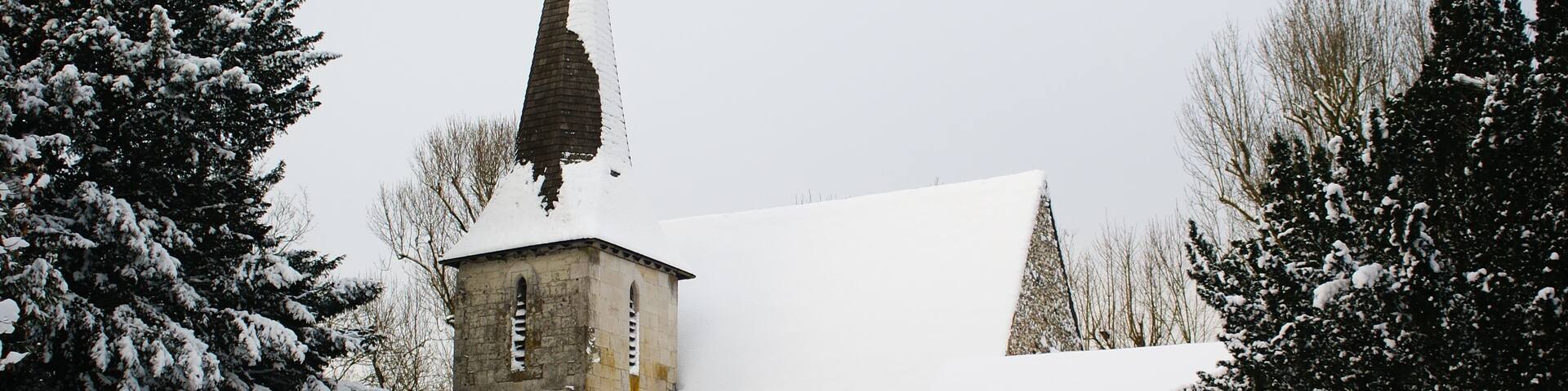 Parish church of SS Peter and Paul, Chaldon, Surrey, seen from the southeast in snow