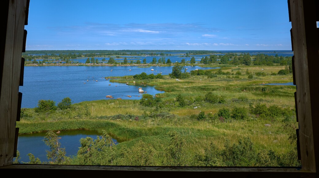Summer landscape from wooden window in FInland, Mustasaari.