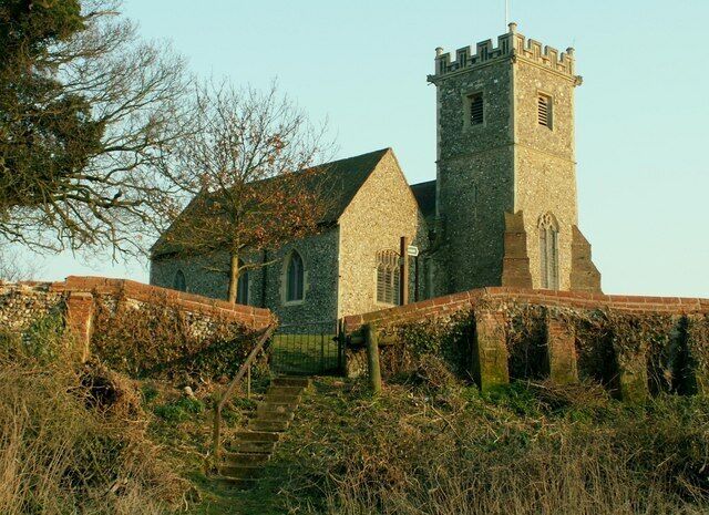 St. Mary's church at Creeting St. Mary This is the view from Church Lane, showing the steps up to the churchyard where a footpath begins. Parts of the church date back to the Norman period, but the tower and north aisle, that appear in this picture, were built in 1884-7.