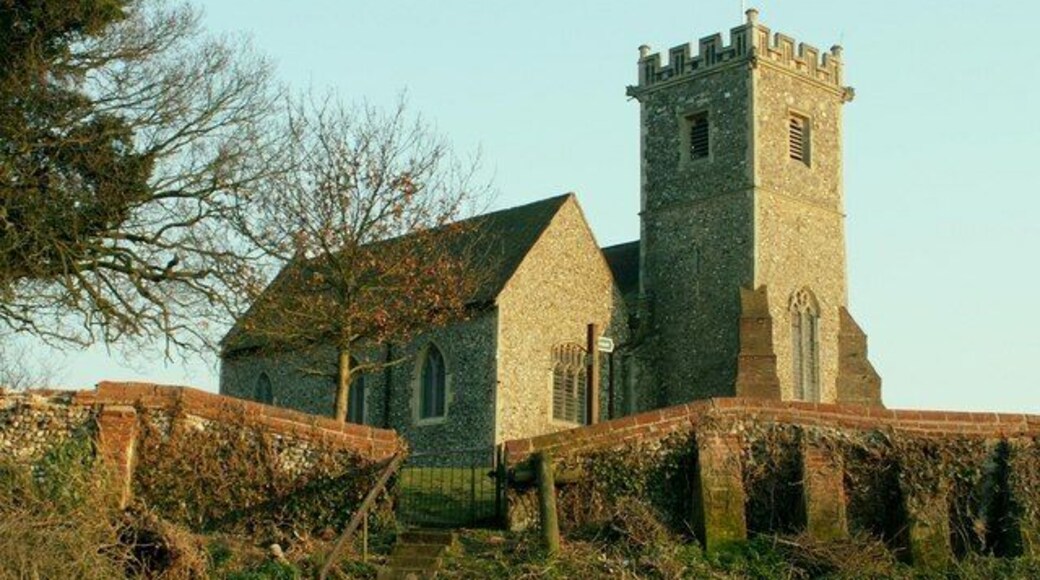 St. Mary's church at Creeting St. Mary This is the view from Church Lane, showing the steps up to the churchyard where a footpath begins. Parts of the church date back to the Norman period, but the tower and north aisle, that appear in this picture, were built in 1884-7.