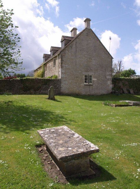 Farmhouse, Miserden Church Farm, the end wall of which overlooks the churchyard at Miserden.