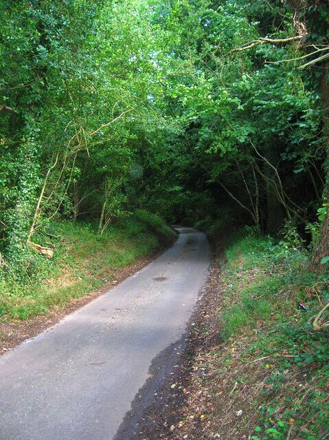 Oldhouse Lane. Heading east downhill through Watergate Hanger to the B2146.