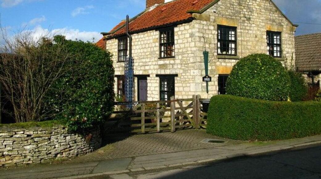 Sawpit Cottage at Slingsby The name and blade on the wall give a hint to the past.