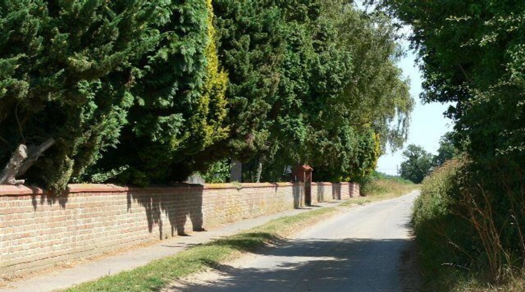 The Balk, Slingsby. Slingsby cemetery is behind the wall in the photograph. The Balk is the name of the lane to it