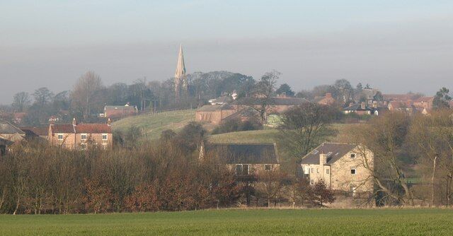 Looking across fields to Hunsingore, North Yorkshire