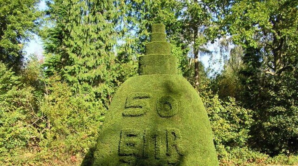Clipsham Yew Tree Avenue — the "Queen's Golden Jubilee" topiary sculpture. Located in the Clipsham Hall Park, near Clipsham, England.