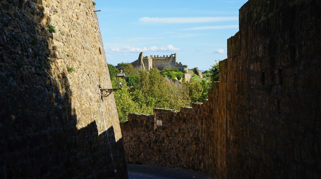San Pietro church view over the hill between Tuscania village's walls, Viterbo, Lazio, Italy