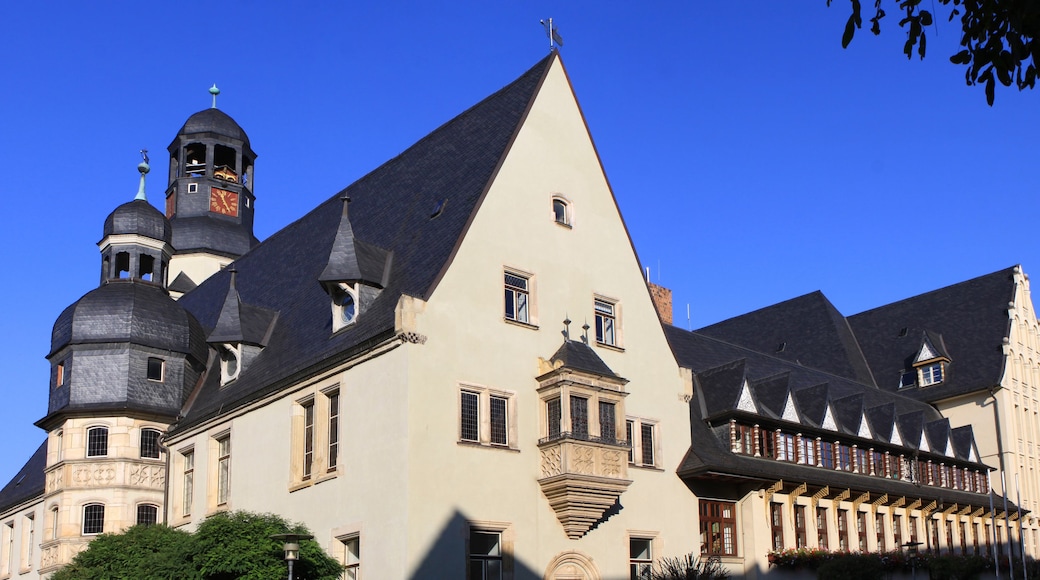 A historic building with a clock tower and ornate architecture.