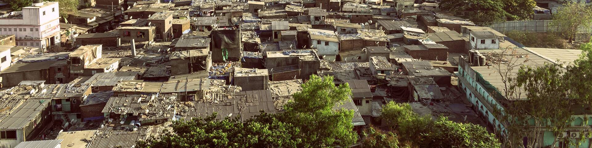 Skyscrapers and slums in a suburb in the city of Mumbai