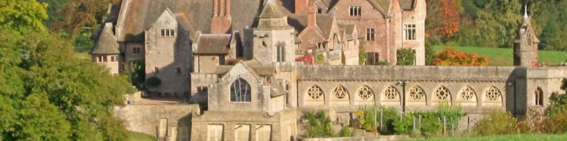 View north-east from the public footpath at the head of the valley. A building of many parts, which has been developed from the original Knights Templar preceptory which was here in 1189. The cloister on the right leads from the formal gardens to the mainly 14th century chapel of St John of Jerusalem on this side of the building at the centre of the picture. The main part of the huge manor house behind is 16th century. We visited the building many years ago when it was open to the public, but it is now a private residence owned by TV, mobile phone and telecommunications entrepreneur Martin Dawes. http://en.wikipedia.org/wiki/Dinmore_Manor