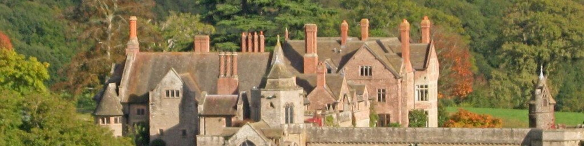 View north-east from the public footpath at the head of the valley. A building of many parts, which has been developed from the original Knights Templar preceptory which was here in 1189. The cloister on the right leads from the formal gardens to the mainly 14th century chapel of St John of Jerusalem on this side of the building at the centre of the picture. The main part of the huge manor house behind is 16th century. We visited the building many years ago when it was open to the public, but it is now a private residence owned by TV, mobile phone and telecommunications entrepreneur Martin Dawes. http://en.wikipedia.org/wiki/Dinmore_Manor