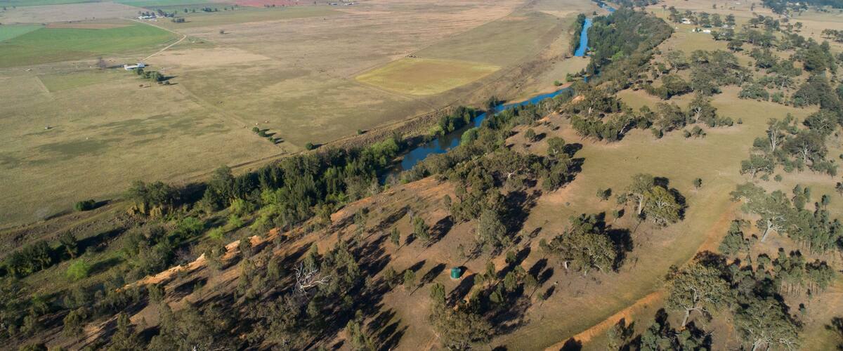 Hunter river winding through farmland